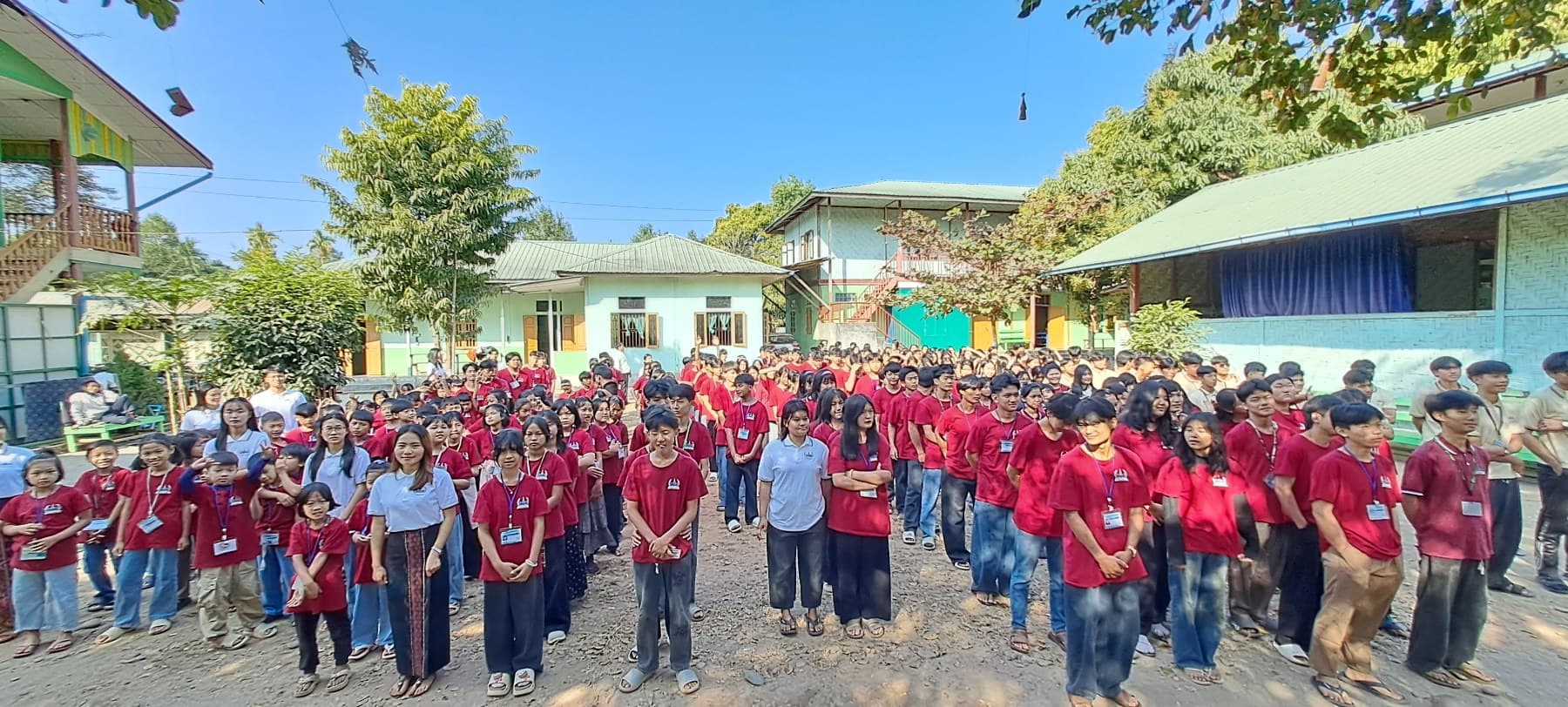 Wisdom Palace students assembled in the school courtyard